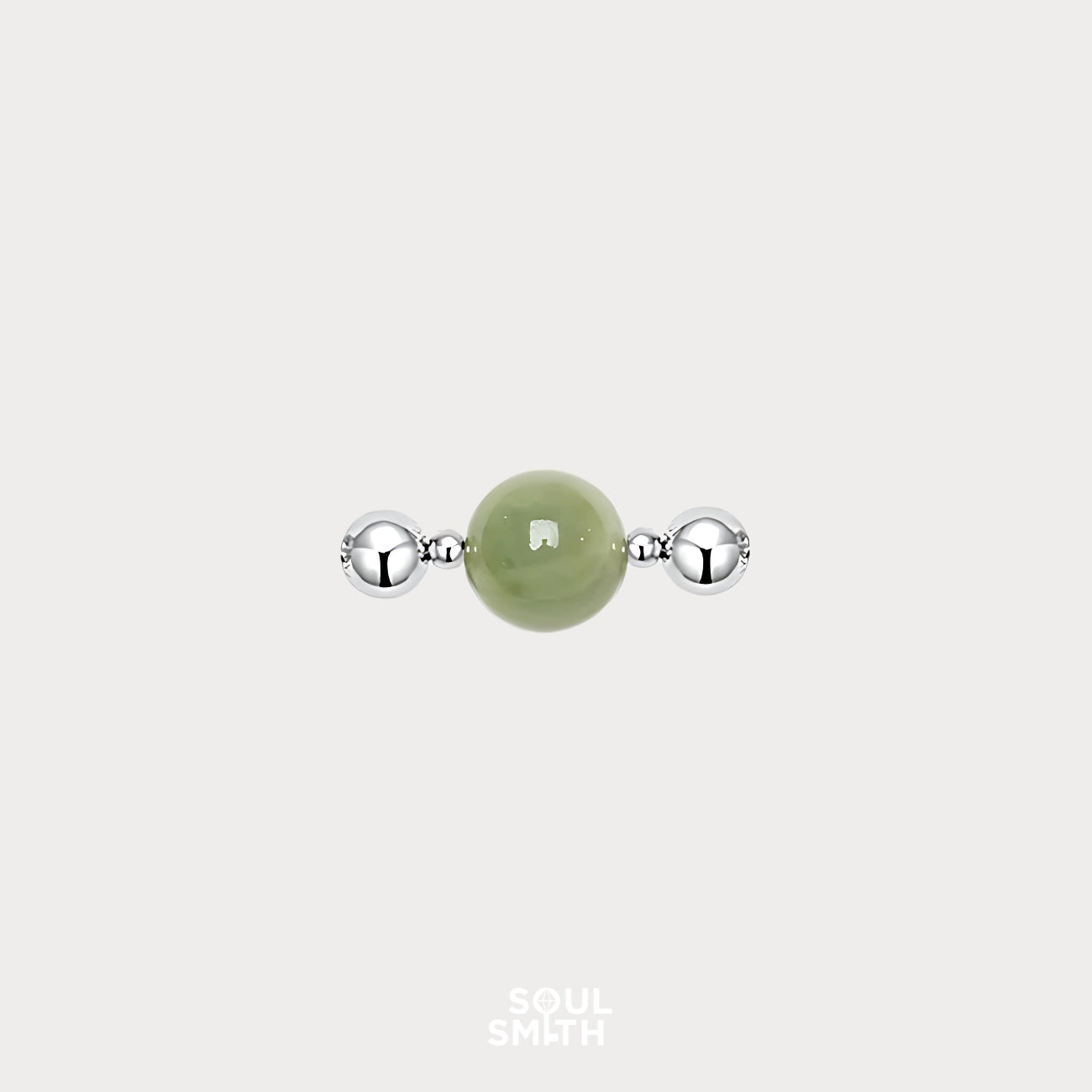 Berylite charm bead for Heart Chakra balance, featuring a soft green gemstone flanked by polished silver accents.