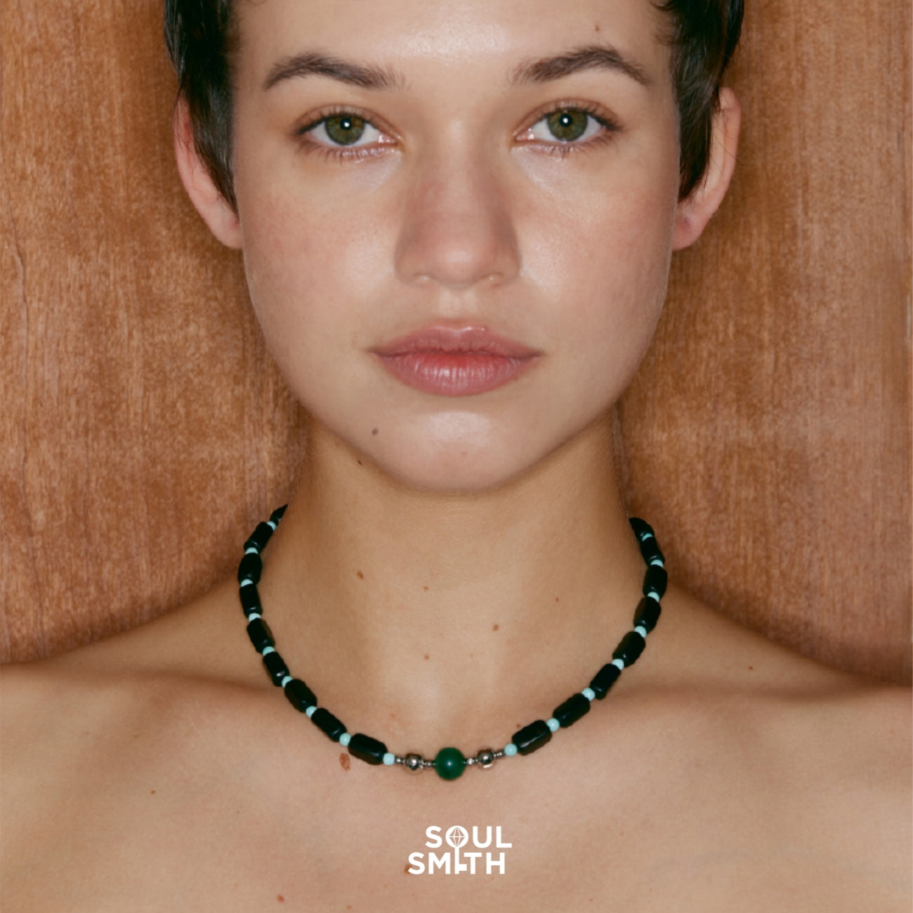 Bold malachite necklace for heart chakra balance worn by woman – SoulSmith