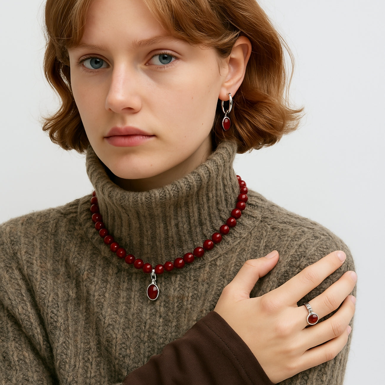 SoulSmith Soullinks red jasper jewelry set – includes grounding crystal necklace, gemstone drop earrings, and healing ring for strength and root chakra support.