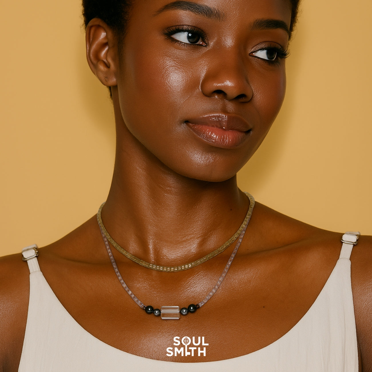 Layered grey moonstone and clear quartz necklace for crown chakra balance – SoulSmith jewelry on deep skin tone