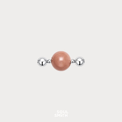 Orange moonstone charm for sacral chakra creativity and flow.

