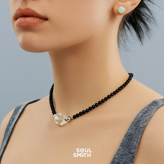 Clear quartz and black agate choker for crown chakra clarity.
