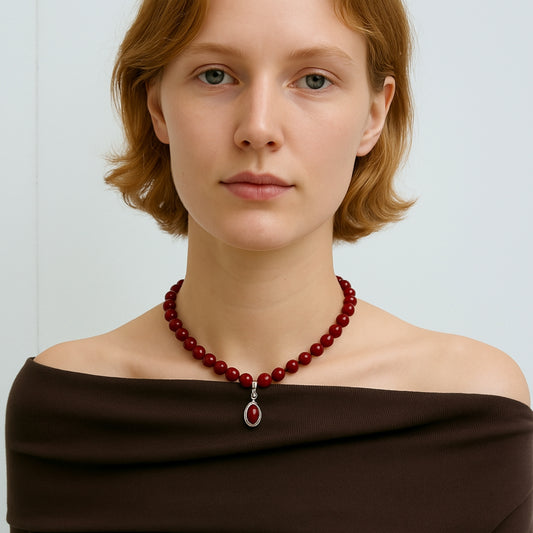 SoulSmith Soullinks red jasper choker necklace with silver drop pendant – grounding gemstone jewelry for root chakra balance and bold minimalist styling.