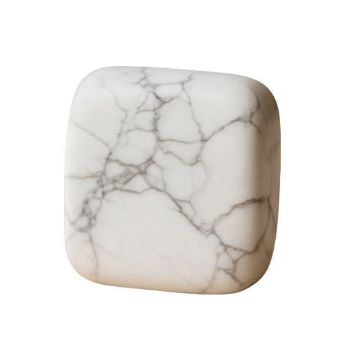 White Howlite tumbled stone with gray veins on transparent background, associated with the Crown Chakra to promote calmness, patience, and higher spiritual consciousness